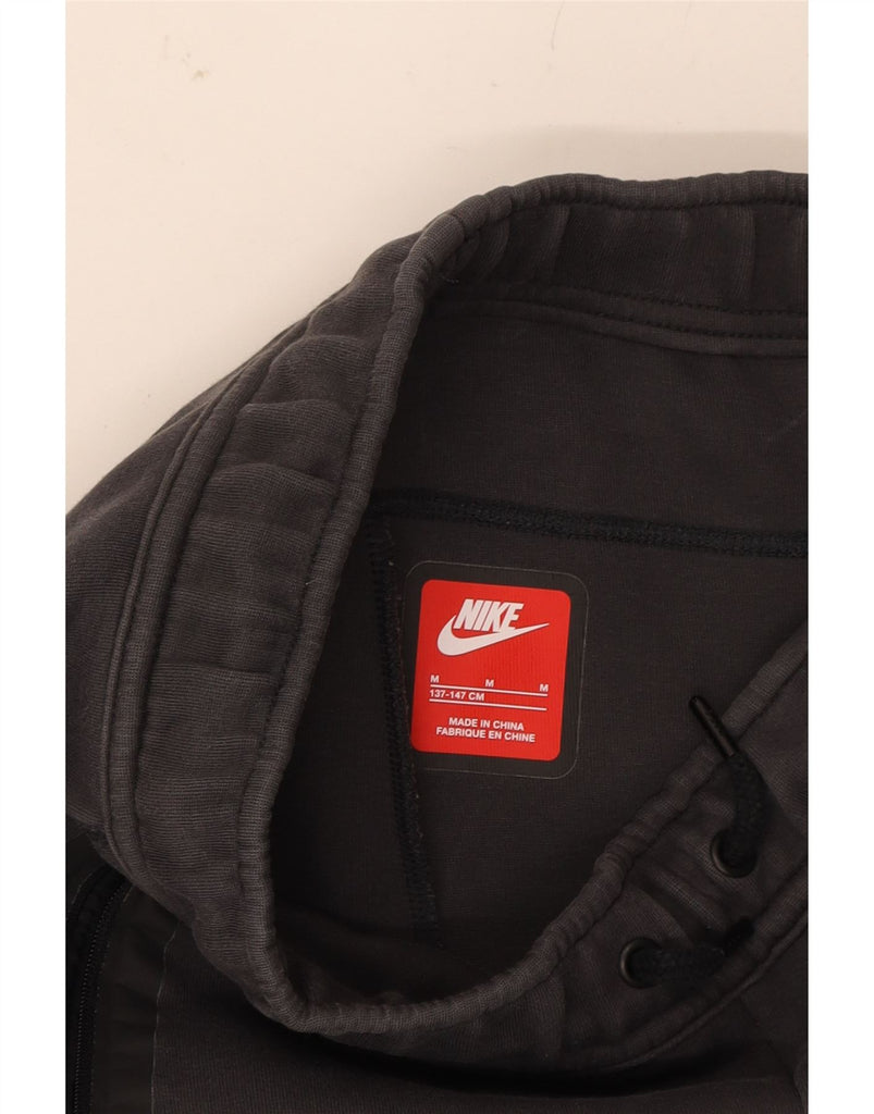 NIKE Boys Tracksuit Trousers Joggers 10-11 Years Medium Black Cotton Vintage Nike and Second-Hand Nike from Messina Hembry 