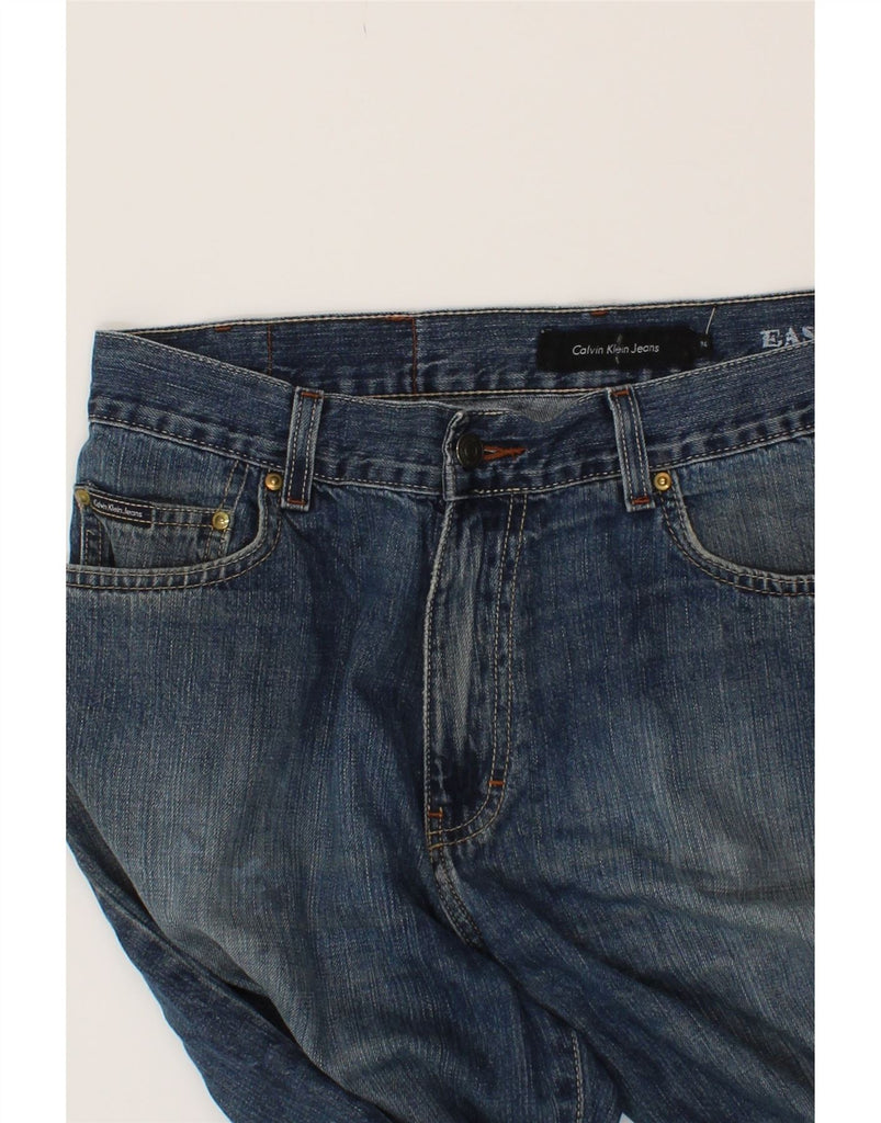 CALVIN KLEIN Mens High Waist Tapered Jeans W34 L30 Blue Vintage Calvin Klein and Second-Hand Calvin Klein from Messina Hembry 