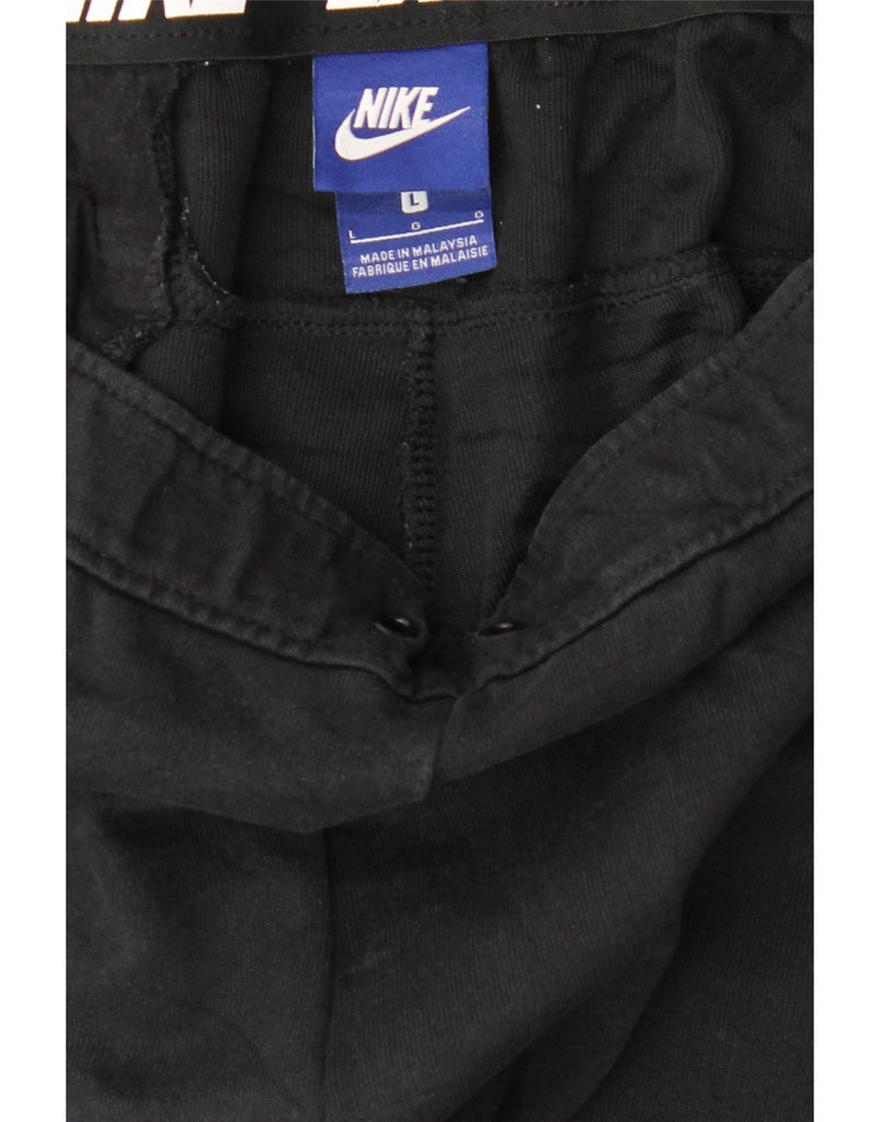 NIKE Womens Graphic Tracksuit Trousers Joggers UK 14 Large  Black Cotton Vintage Nike and Second-Hand Nike from Messina Hembry 