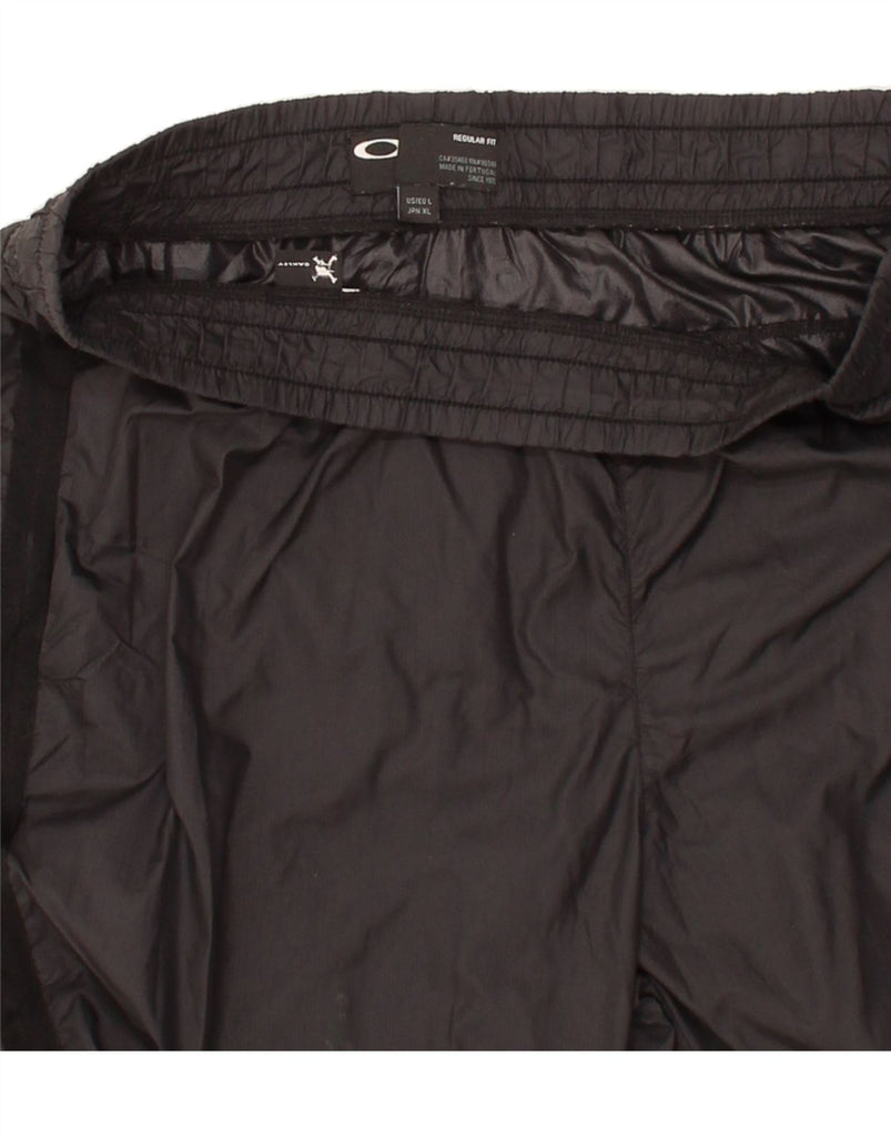 OAKLEY Womens Tracksuit Trousers UK 14 Large Black Polyester Vintage Oakley and Second-Hand Oakley from Messina Hembry 