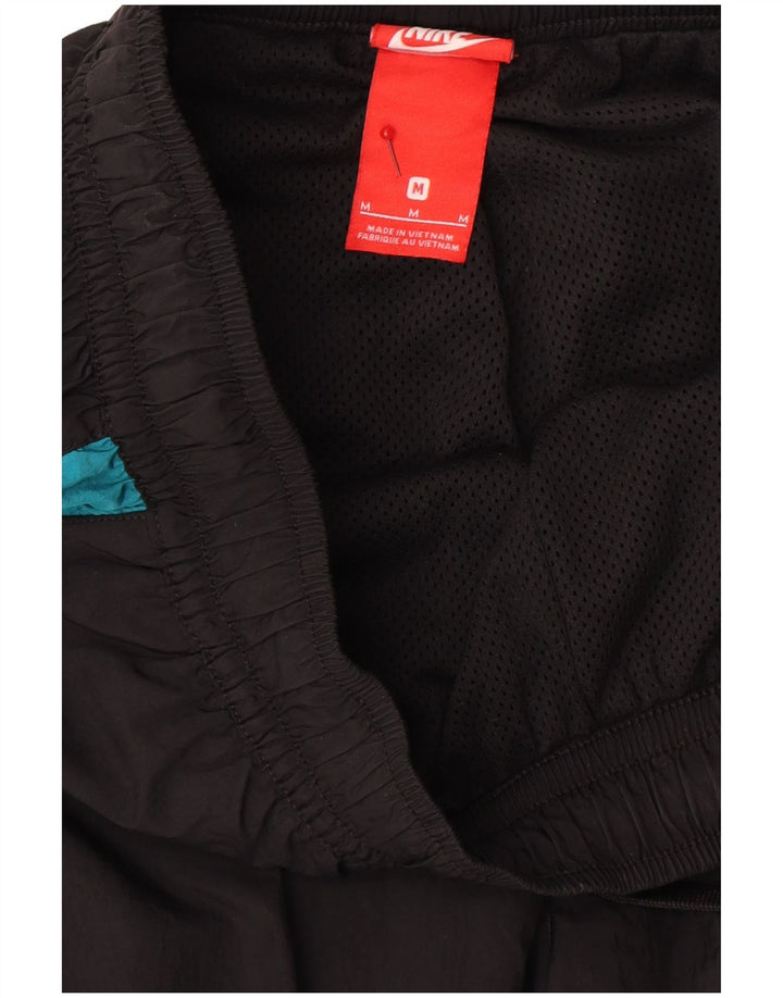 NIKE Mens Graphic Tracksuit Trousers Joggers Medium  Black Colourblock