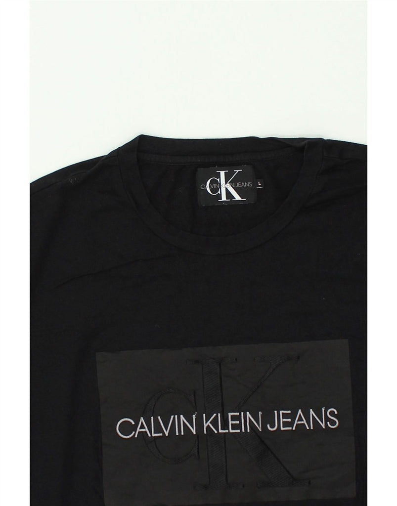 CALVIN KLEIN JEANS Womens Graphic T-Shirt Top UK 16 Large Black Cotton | Vintage Calvin Klein Jeans | Thrift | Second-Hand Calvin Klein Jeans | Used Clothing | Messina Hembry 