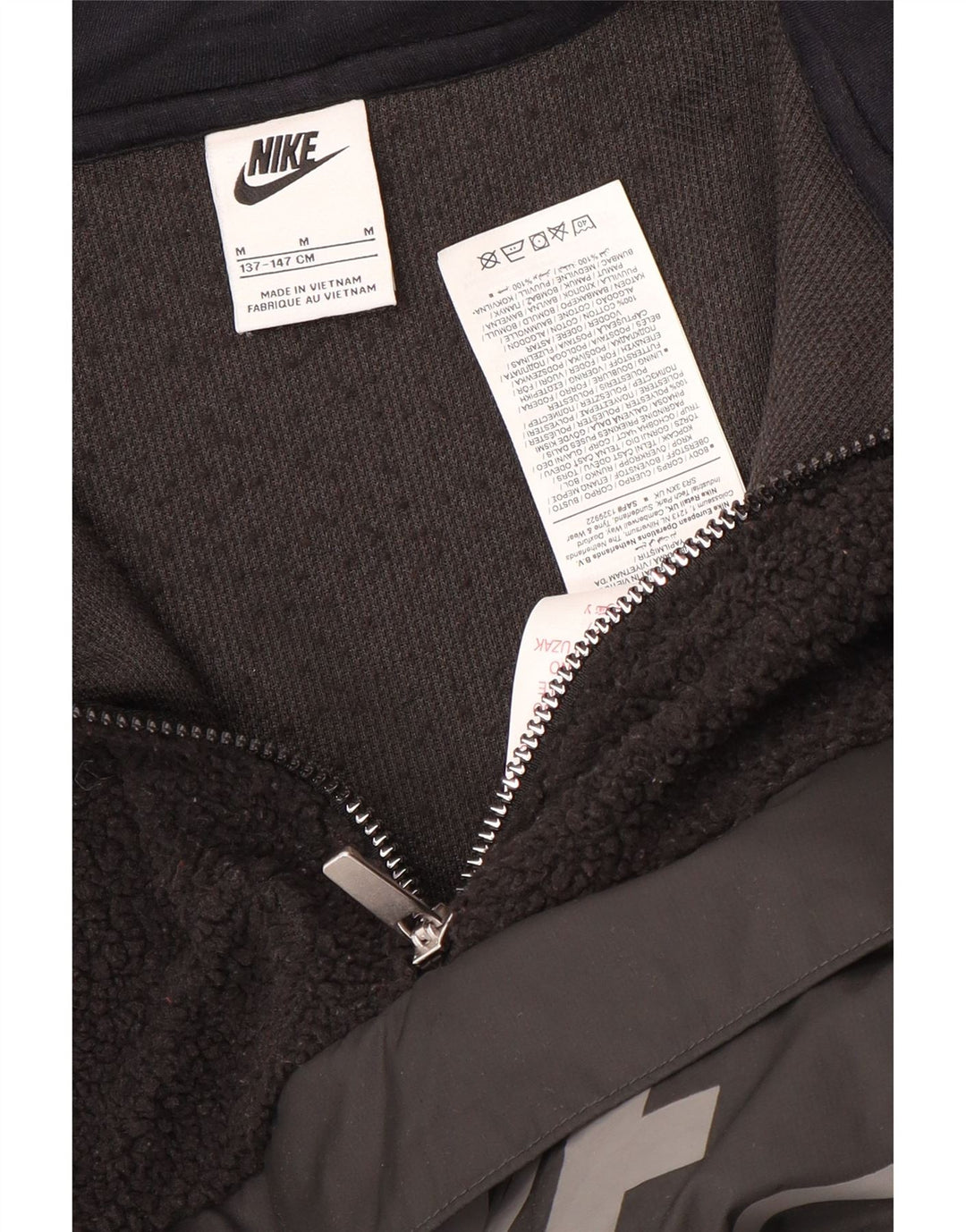 Nike Boys Graphic Zip Neck Fleece Jumper 10-11 Years Medium Black Polyester
