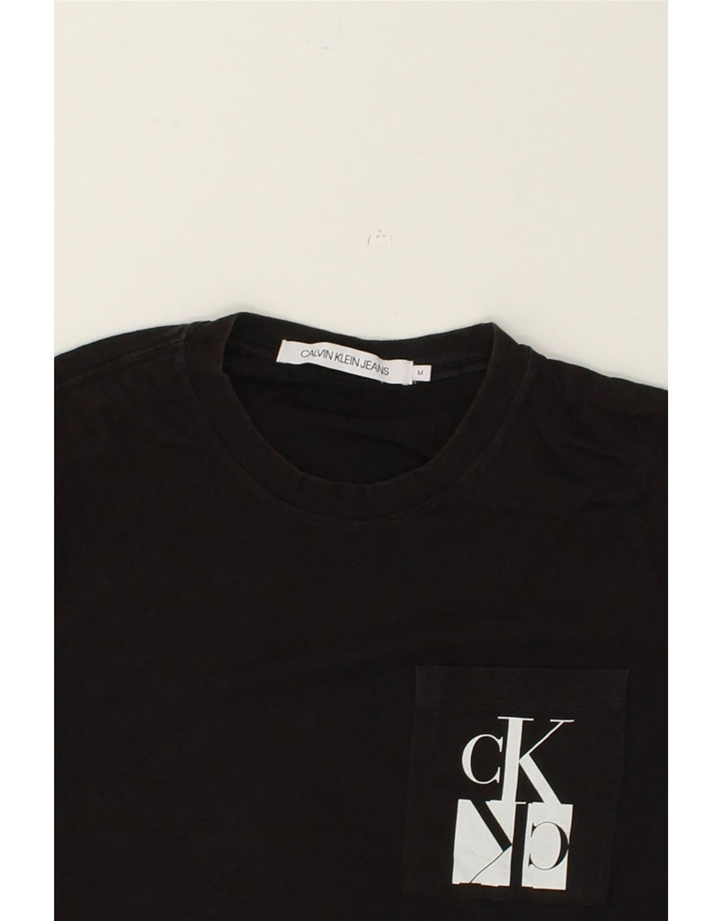 CALVIN KLEIN JEANS Mens Graphic T-Shirt Top Medium Black Cotton | Vintage Calvin Klein Jeans | Thrift | Second-Hand Calvin Klein Jeans | Used Clothing | Messina Hembry 