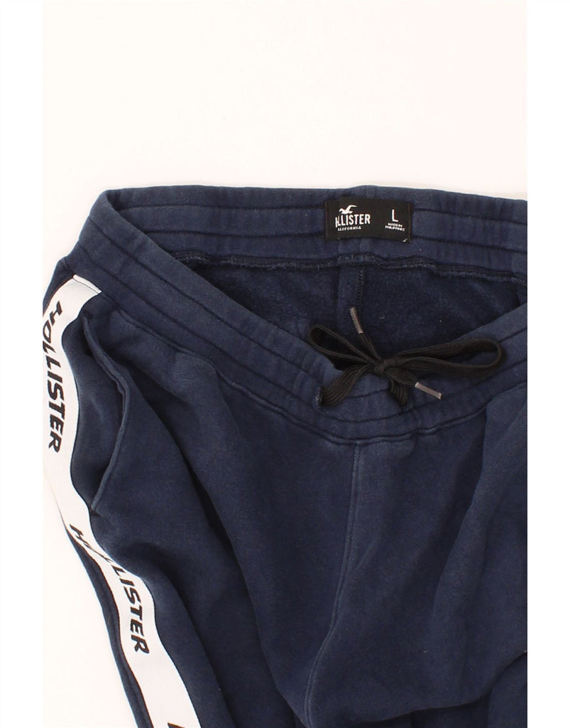 HOLLISTER Mens Graphic Tracksuit Trousers Joggers Large Navy Blue Cotton Vintage Hollister and Second-Hand Hollister from Messina Hembry 