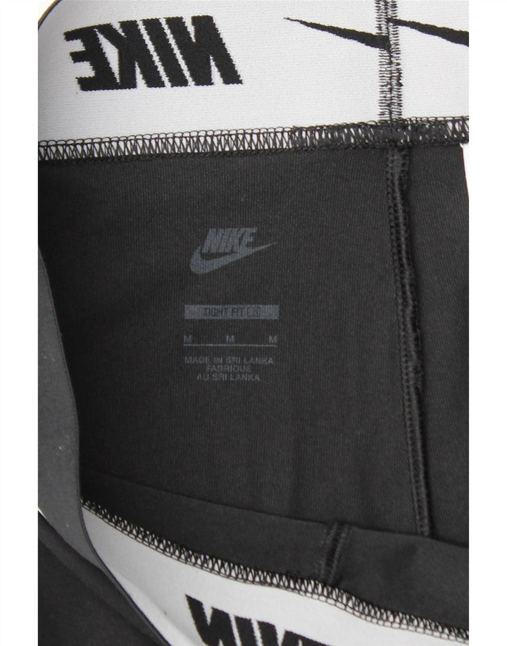 NIKE Womens Tight Fit Graphic Leggings UK 12 Medium  Black Cotton