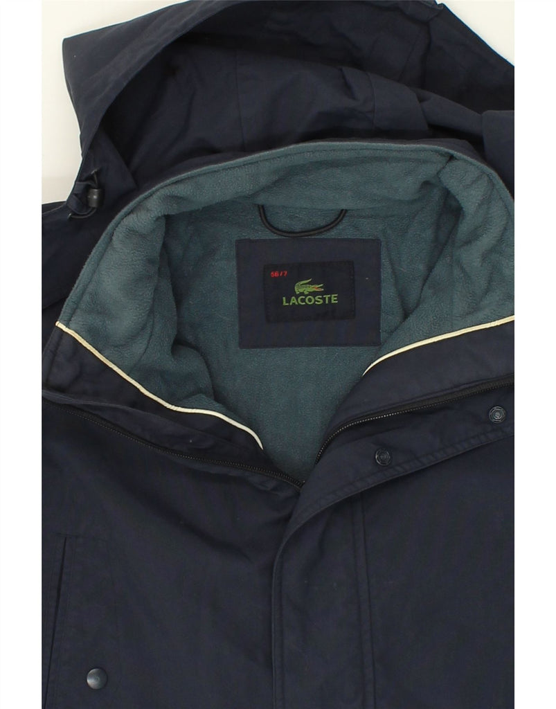 LACOSTE Mens Hooded Windbreaker Jacket Size 7 2XL Navy Blue Polyamide | Vintage Lacoste | Thrift | Second-Hand Lacoste | Used Clothing | Messina Hembry 