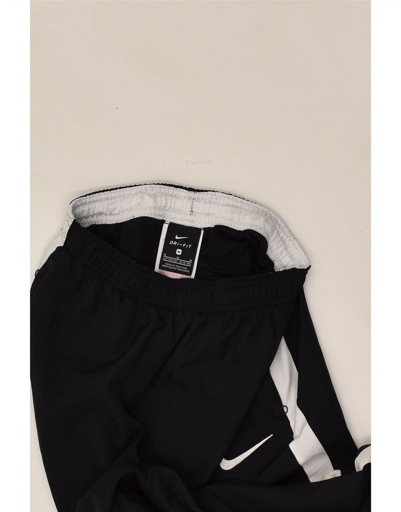 NIKE Girls Tracksuit Trousers 10-11 Years Medium Black Polyester | Vintage Nike | Thrift | Second-Hand Nike | Used Clothing | Messina Hembry 