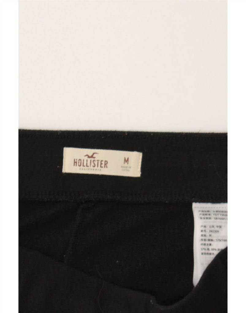 HOLLISTER Womens Graphic Tracksuit Trousers Joggers UK 14 Medium  Black Vintage Hollister and Second-Hand Hollister from Messina Hembry 
