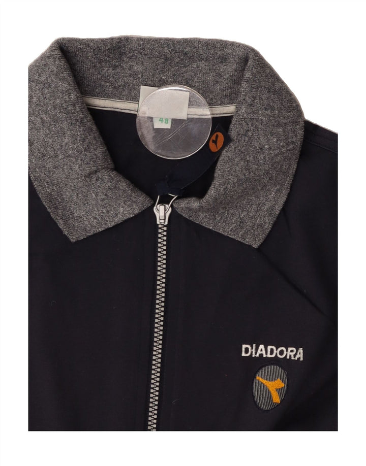 DIADORA Mens Polo Shirt IT 48 Medium Navy Blue Colourblock Cotton Vintage Diadora and Second-Hand Diadora from Messina Hembry 