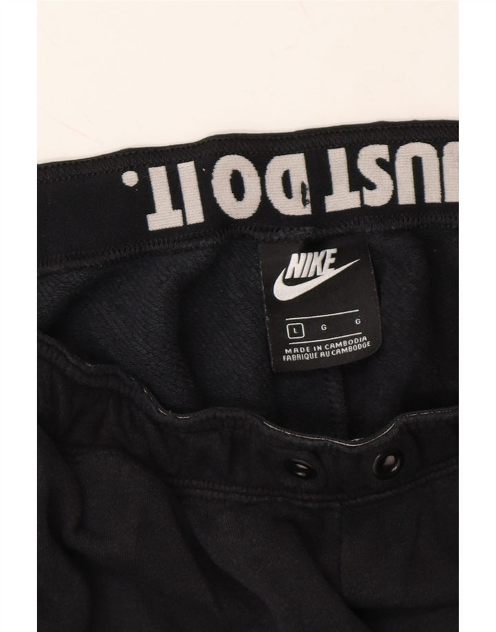 NIKE Mens Graphic Tracksuit Trousers Joggers Large  Black Vintage Nike and Second-Hand Nike from Messina Hembry 