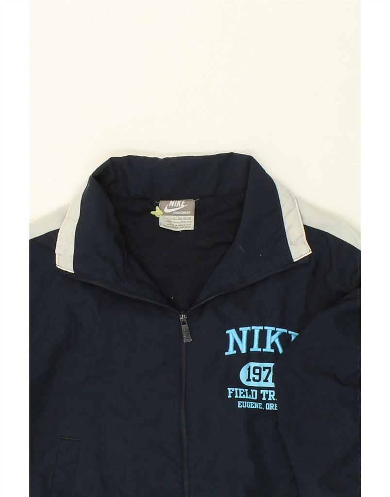 NIKE Boys Graphic Tracksuit Top Jacket 4-5 Years Small Navy Blue Vintage Nike and Second-Hand Nike from Messina Hembry 