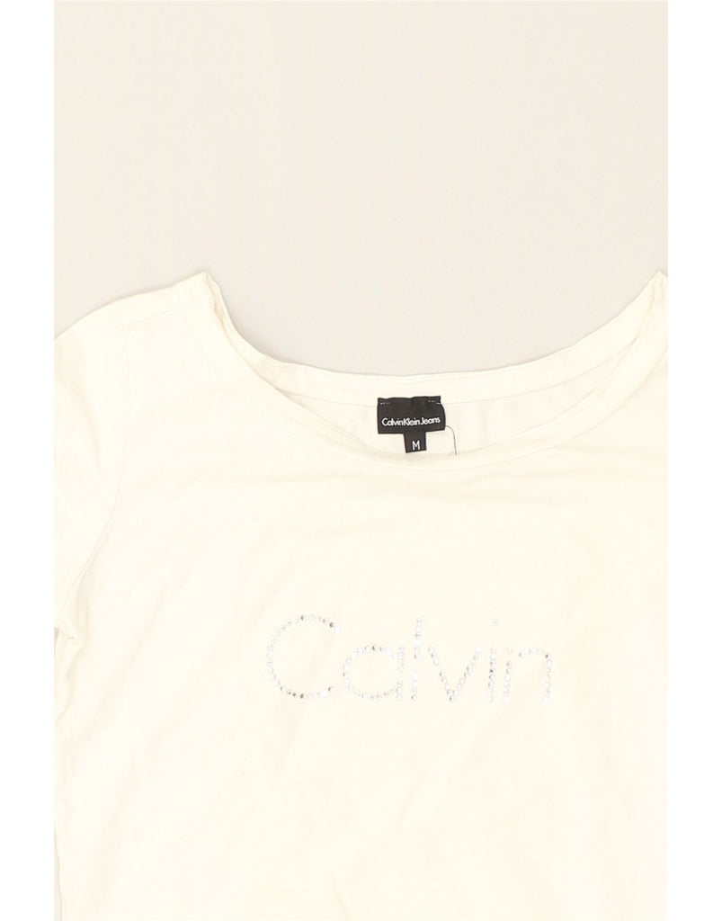 CALVIN KLEIN Womens Graphic T-Shirt Top UK 12 Medium Off White Cotton | Vintage Calvin Klein | Thrift | Second-Hand Calvin Klein | Used Clothing | Messina Hembry 