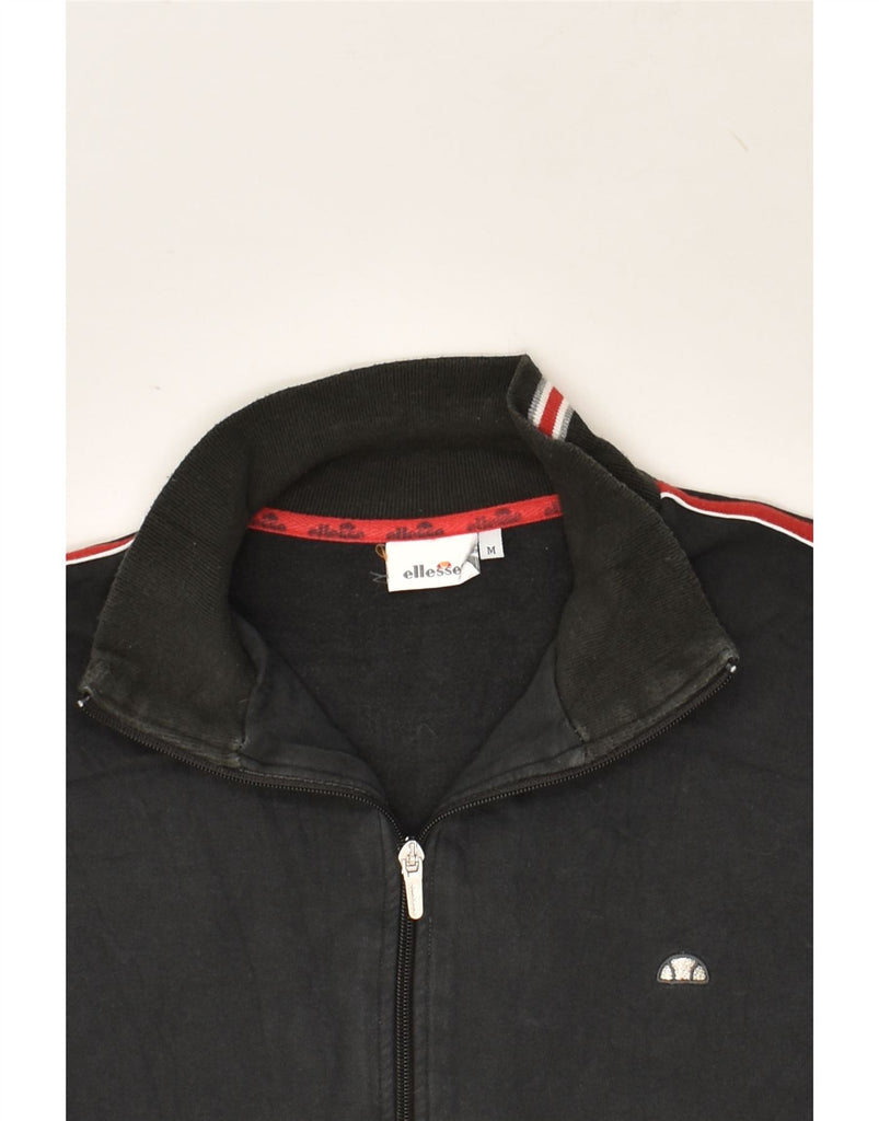 ELLESSE Womens Tracksuit Top Jacket UK 14 Medium Black Cotton | Vintage Ellesse | Thrift | Second-Hand Ellesse | Used Clothing | Messina Hembry 