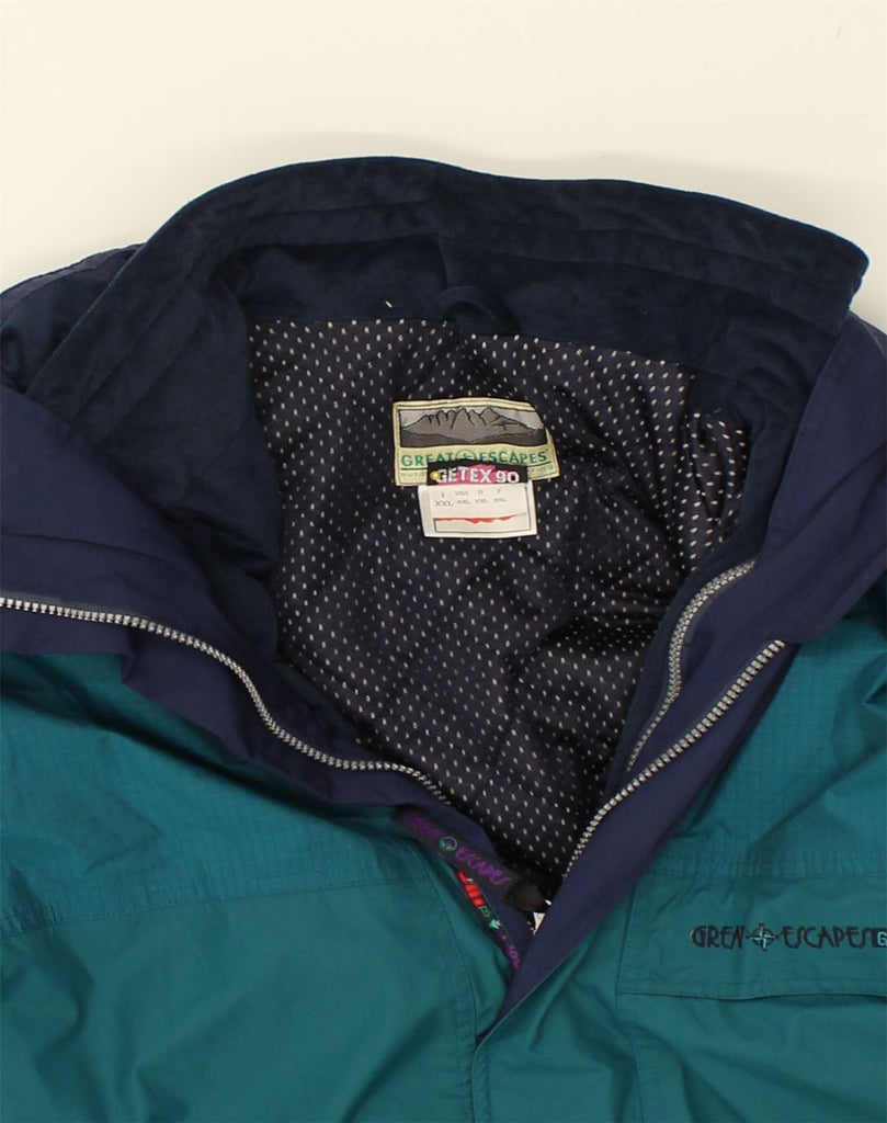 GREAT ESCAPES Mens Hooded Windbreaker Jacket UK 44 2XL Turquoise Polyester | Vintage Great Escapes | Thrift | Second-Hand Great Escapes | Used Clothing | Messina Hembry 