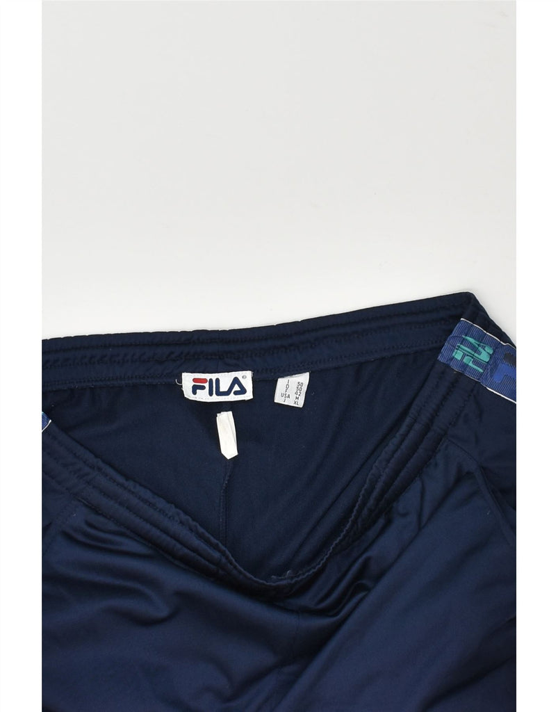 FILA Mens Graphic Tracksuit Trousers IT 50 Large Navy Blue Polyester | Vintage Fila | Thrift | Second-Hand Fila | Used Clothing | Messina Hembry 