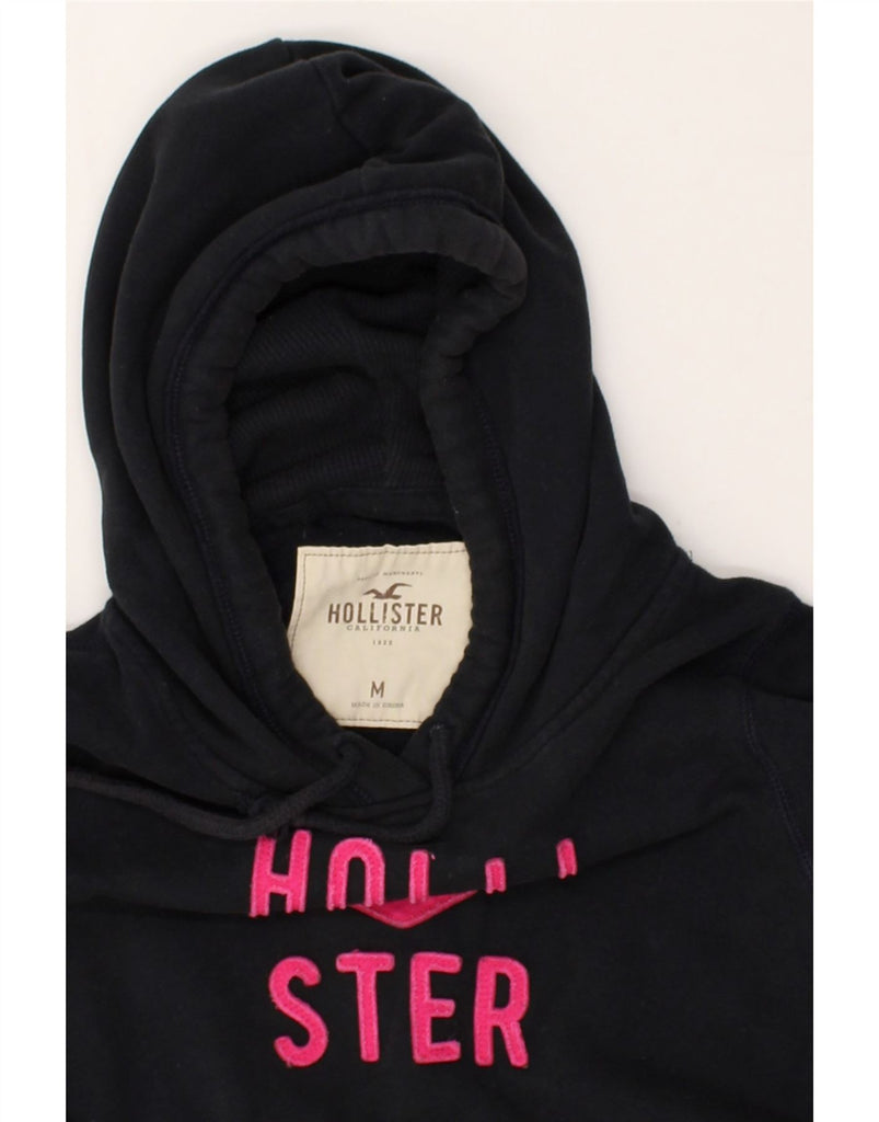 HOLLISTER Womens Graphic Hoodie Jumper UK 14 Medium Navy Blue Cotton | Vintage Hollister | Thrift | Second-Hand Hollister | Used Clothing | Messina Hembry 