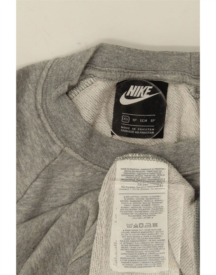 NIKE Womens Oversized Graphic Sweatshirt Jumper UK 6 XS Grey Cotton Vintage Nike and Second-Hand Nike from Messina Hembry 