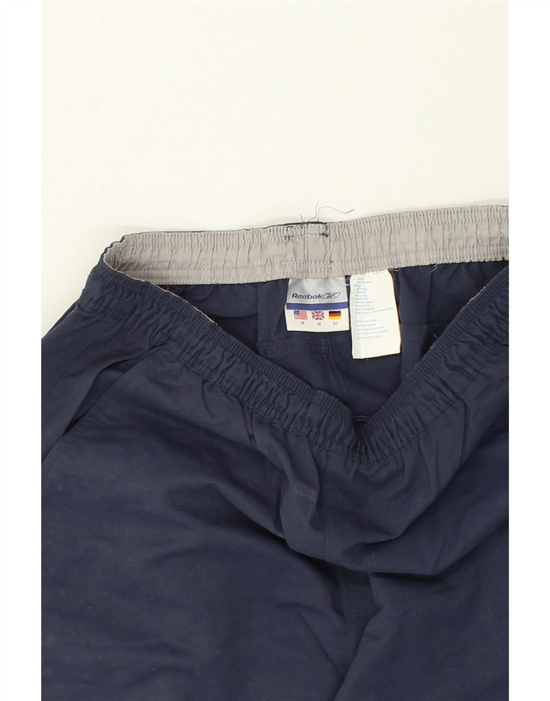 REEBOK Mens Tracksuit Trousers Medium Navy Blue Nylon | Vintage Reebok | Thrift | Second-Hand Reebok | Used Clothing | Messina Hembry 