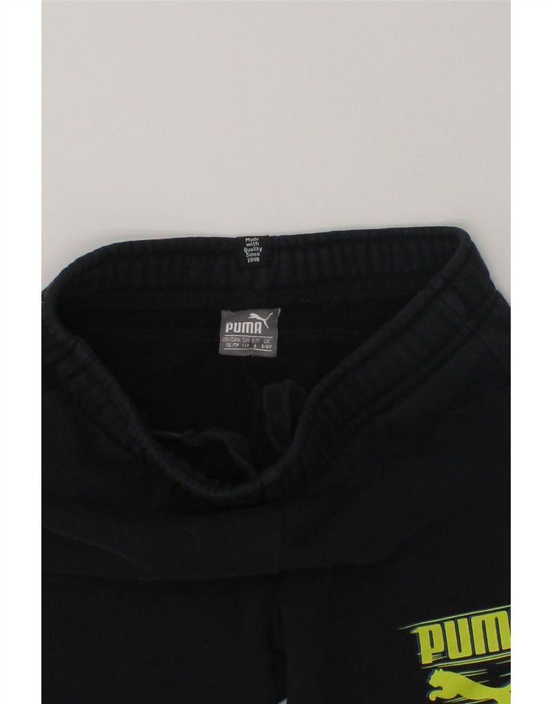 PUMA Boys Graphic Tracksuit Trousers Joggers 5-6 Years Black | Vintage Puma | Thrift | Second-Hand Puma | Used Clothing | Messina Hembry 