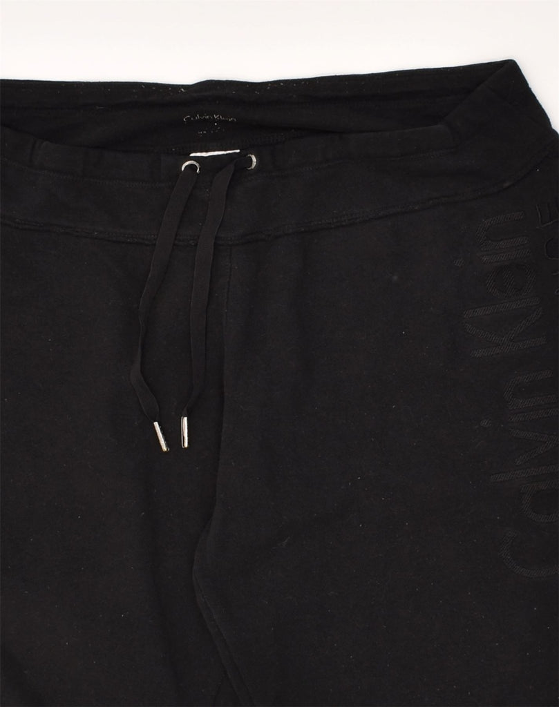 CALVIN KLEIN Womens Graphic Tracksuit Trousers Joggers UK 14 Large Black | Vintage Calvin Klein | Thrift | Second-Hand Calvin Klein | Used Clothing | Messina Hembry 