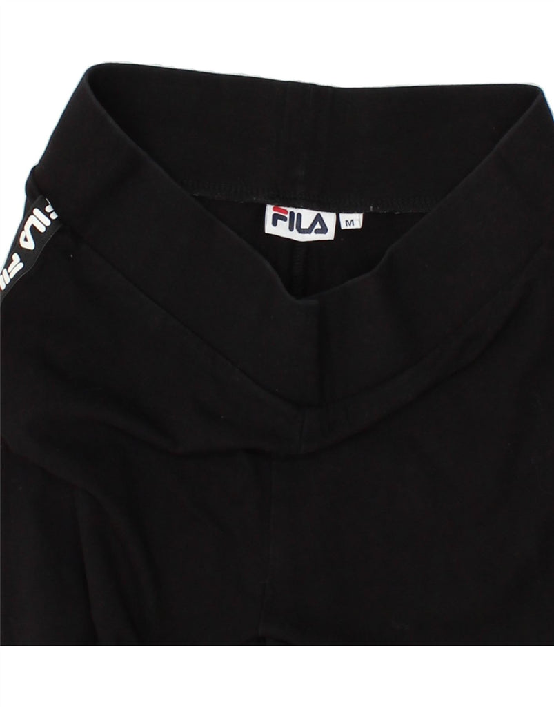 FILA Womens Graphic Leggings UK 12 Medium Black Vintage Fila and Second-Hand Fila from Messina Hembry 