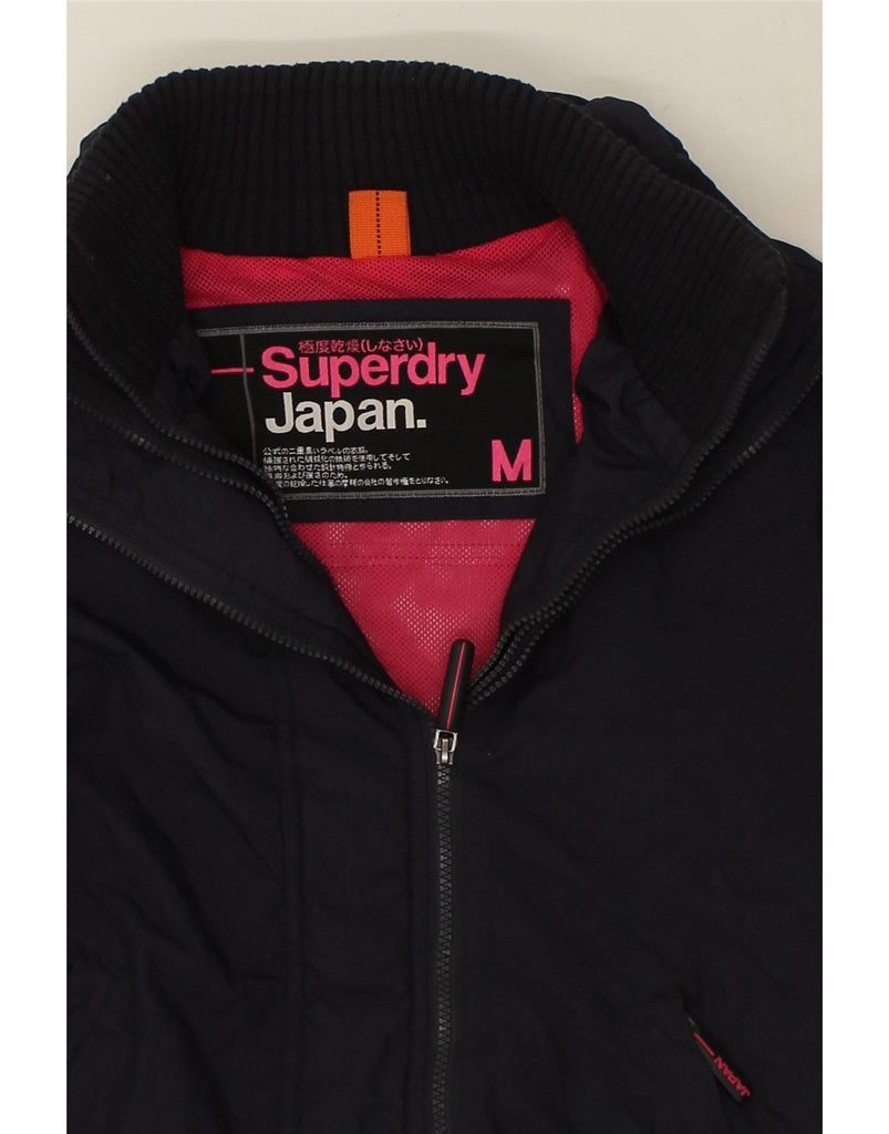 SUPERDRY Womens Graphic Windbreaker Jacket UK 14 Medium Navy Blue Nylon | Vintage Superdry | Thrift | Second-Hand Superdry | Used Clothing | Messina Hembry 