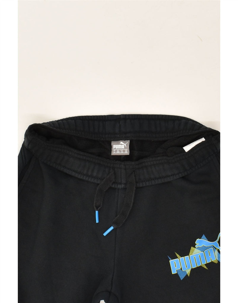 PUMA Boys Graphic Tracksuit Trousers Joggers 11-12 Years Large Black | Vintage Puma | Thrift | Second-Hand Puma | Used Clothing | Messina Hembry 