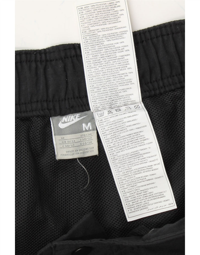 NIKE Mens Graphic Bermuda Sport Shorts Medium Black Polyester Vintage Nike and Second-Hand Nike from Messina Hembry 