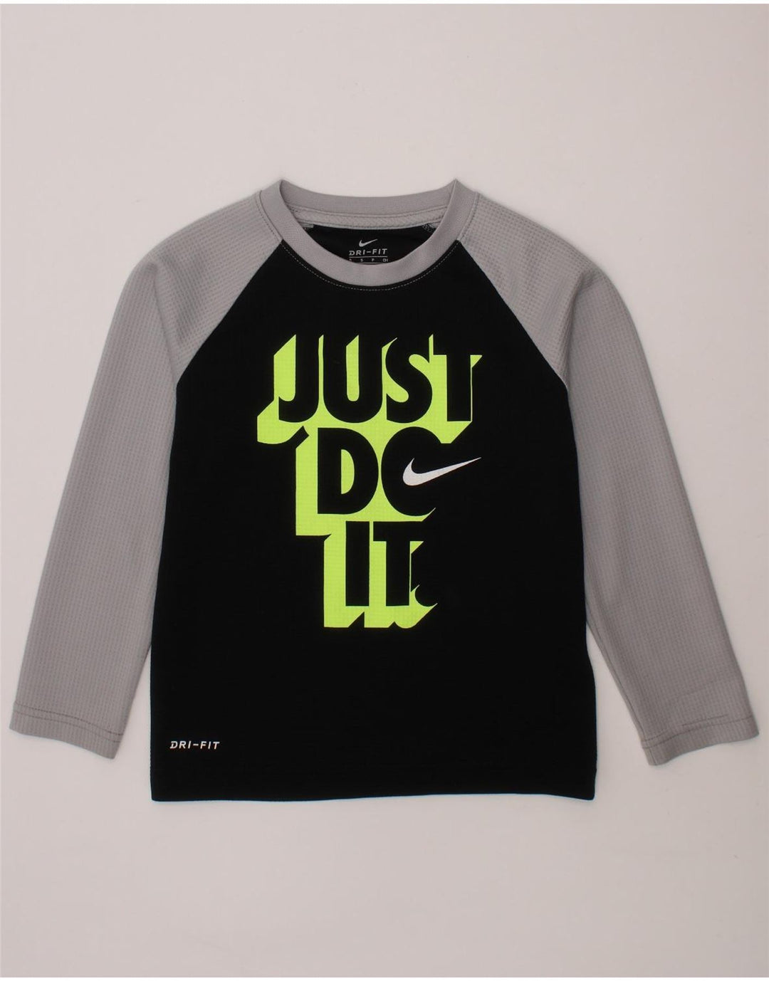 NIKE Boys Dri Fit Graphic Top Long Sleeve 4-5 Years Black Colourblock Vintage Nike and Second-Hand Nike from Messina Hembry 