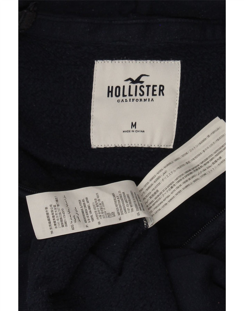 HOLLISTER Mens Zip Hoodie Sweater Medium Navy Blue Cotton Vintage Hollister and Second-Hand Hollister from Messina Hembry 