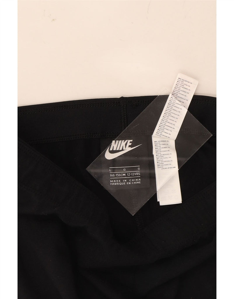 NIKE Girls Tight Fit Graphic Leggings 12-13 Years Large Black Cotton Vintage Nike and Second-Hand Nike from Messina Hembry 