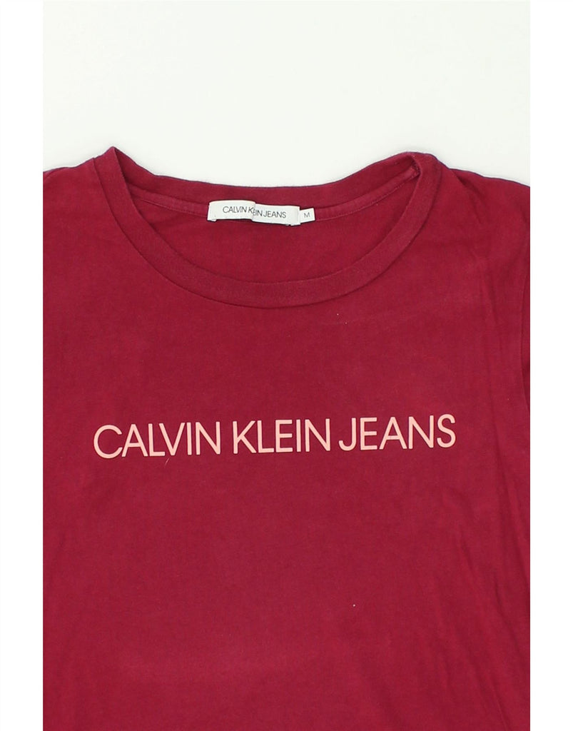 CALVIN KLEIN JEANS Womens Graphic T-Shirt Top UK 12 Medium Pink Cotton | Vintage Calvin Klein Jeans | Thrift | Second-Hand Calvin Klein Jeans | Used Clothing | Messina Hembry 