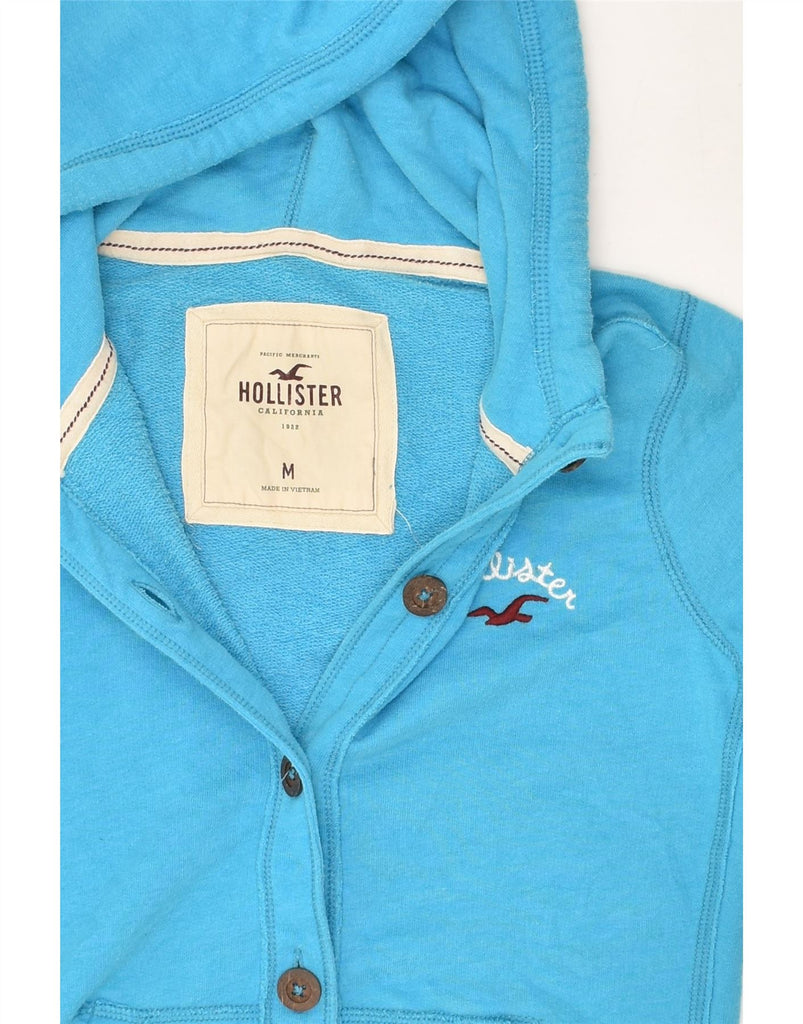 HOLLISTER Womens Graphic Hooded Tracksuit Top Jacket UK 12 Medium Blue | Vintage Hollister | Thrift | Second-Hand Hollister | Used Clothing | Messina Hembry 