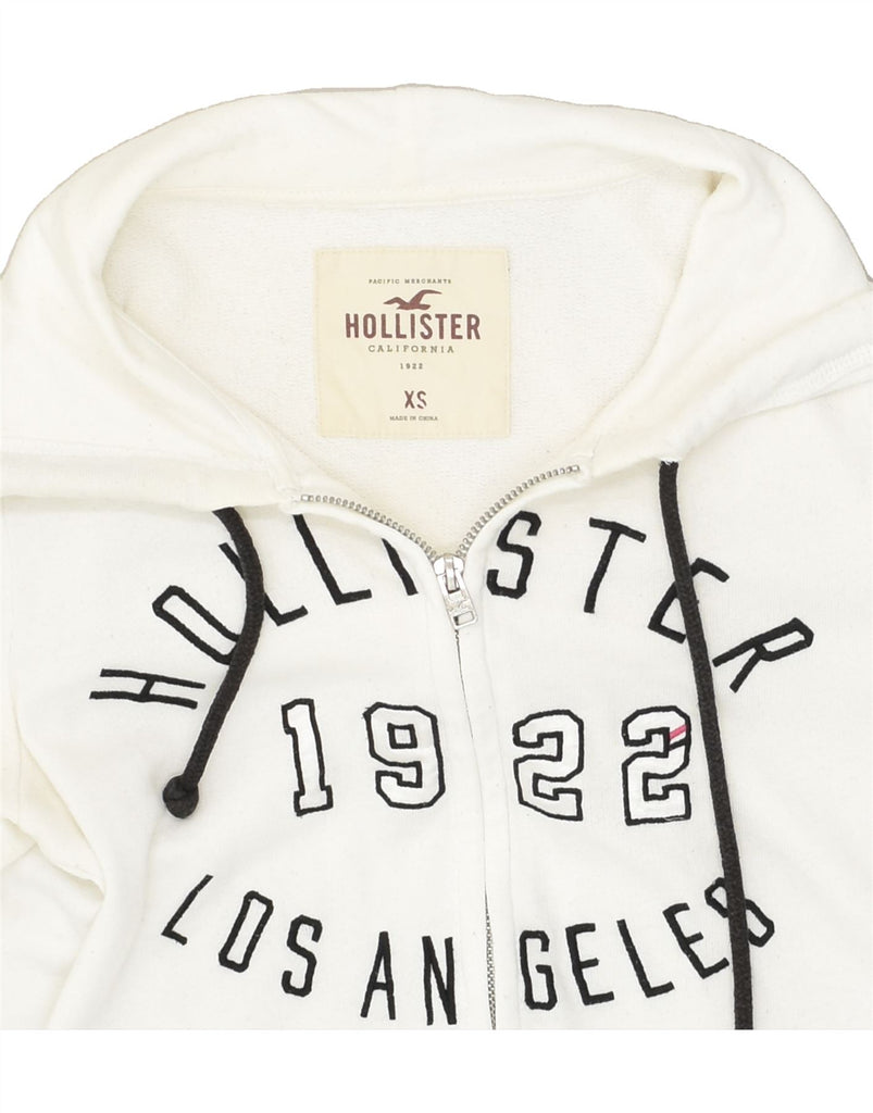 HOLLISTER Womens Graphic Zip Hoodie Sweater UK 6 XS White Cotton | Vintage Hollister | Thrift | Second-Hand Hollister | Used Clothing | Messina Hembry 