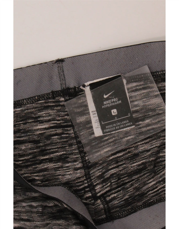 NIKE Womens Graphic Leggings UK 14 Large  Black Striped Polyester
