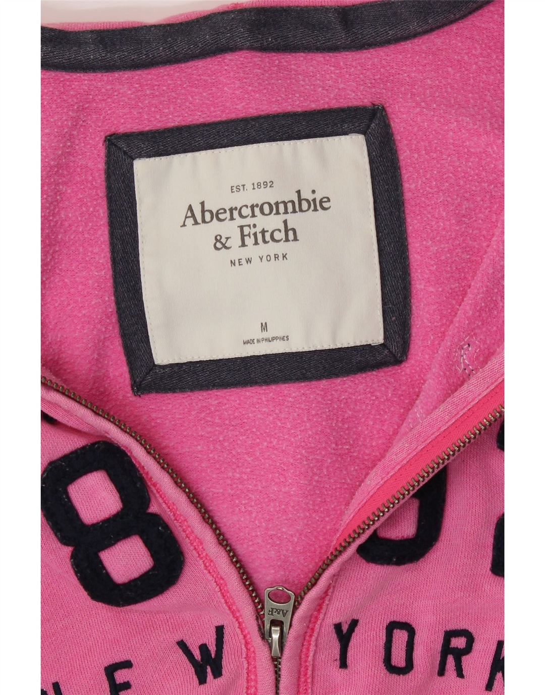 ABERCROMBIE & FITCH Womens Graphic Zip Hoodie Sweater UK 14 Medium Pink Vintage Abercrombie & Fitch and Second-Hand Abercrombie & Fitch from Messina Hembry 