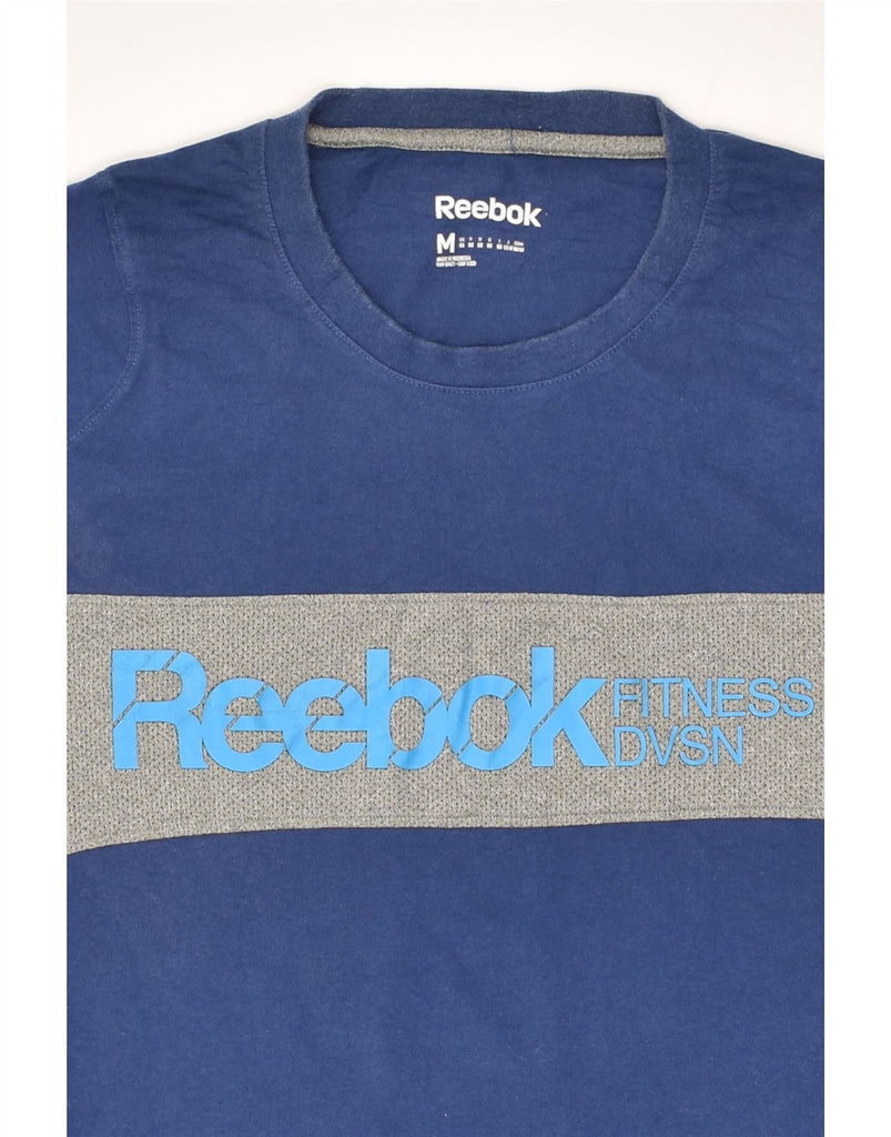 REEBOK Mens Graphic T-Shirt Top Medium Blue Colourblock Cotton | Vintage Reebok | Thrift | Second-Hand Reebok | Used Clothing | Messina Hembry 