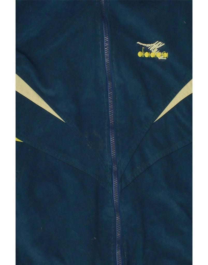 DIADORA Mens Loose Fit Graphic Tracksuit Top Jacket UK 40 Medium Blue Vintage Diadora and Second-Hand Diadora from Messina Hembry 