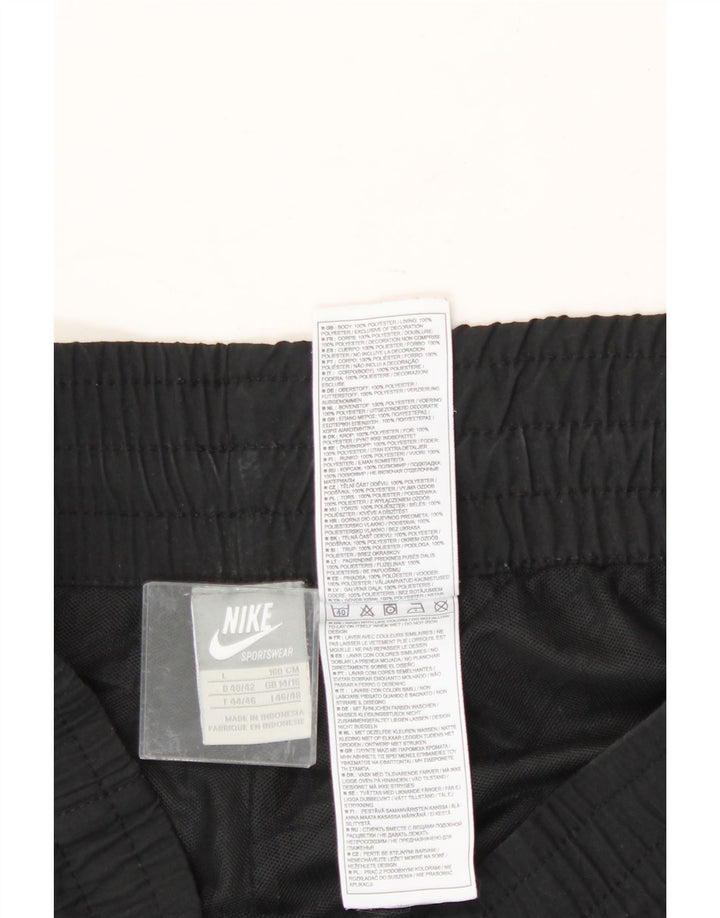 NIKE Womens Tracksuit Trousers UK 14/16 Large Black Polyester Vintage Nike and Second-Hand Nike from Messina Hembry 