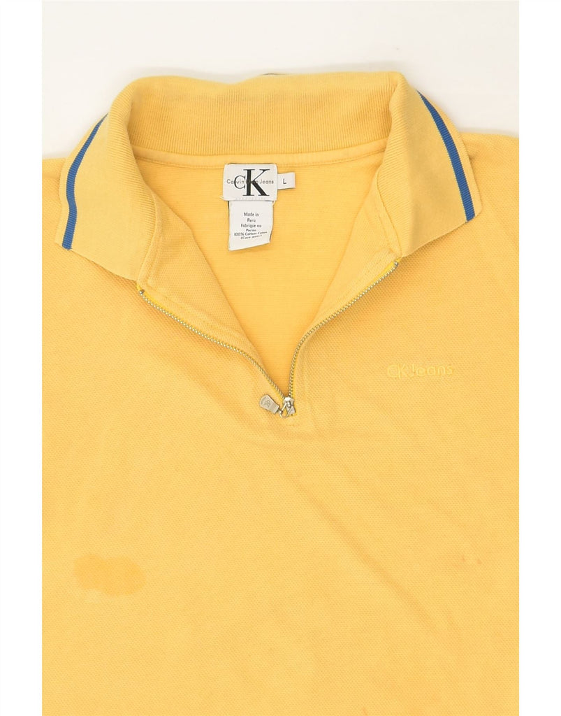 CALVIN KLEIN JEANS Mens Polo Shirt Large Yellow Cotton | Vintage Calvin Klein Jeans | Thrift | Second-Hand Calvin Klein Jeans | Used Clothing | Messina Hembry 