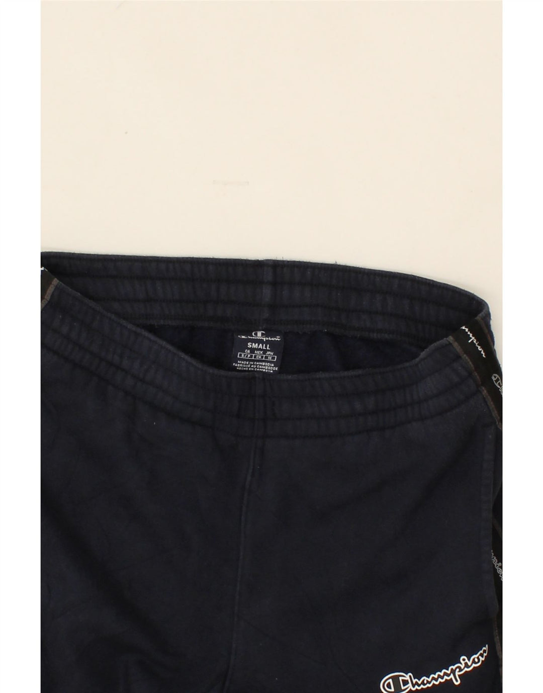 CHAMPION Mens Graphic Tracksuit Trousers Joggers Small Navy Blue Vintage Champion and Second-Hand Champion from Messina Hembry 