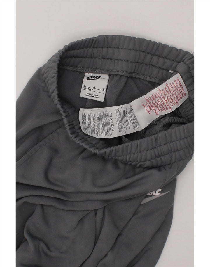 NIKE Boys Tracksuit Trousers Joggers 10-11 Years Medium  Grey Polyester Vintage Nike and Second-Hand Nike from Messina Hembry 