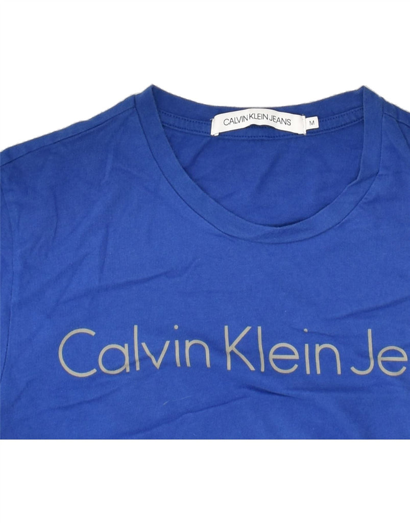 CALVIN KLEIN Mens Graphic T-Shirt Top Medium Blue Cotton | Vintage Calvin Klein | Thrift | Second-Hand Calvin Klein | Used Clothing | Messina Hembry 