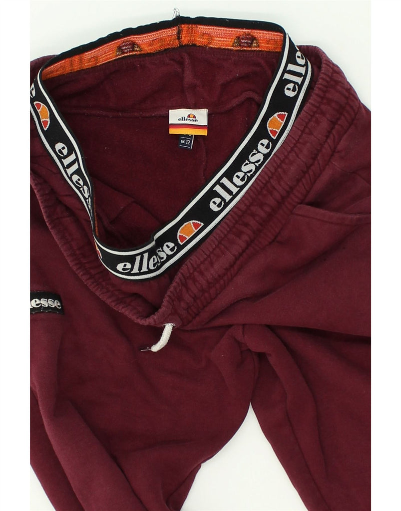 ELLESSE Womens Graphic Tracksuit Trousers Joggers UK 12 Medium  Burgundy | Vintage Ellesse | Thrift | Second-Hand Ellesse | Used Clothing | Messina Hembry 
