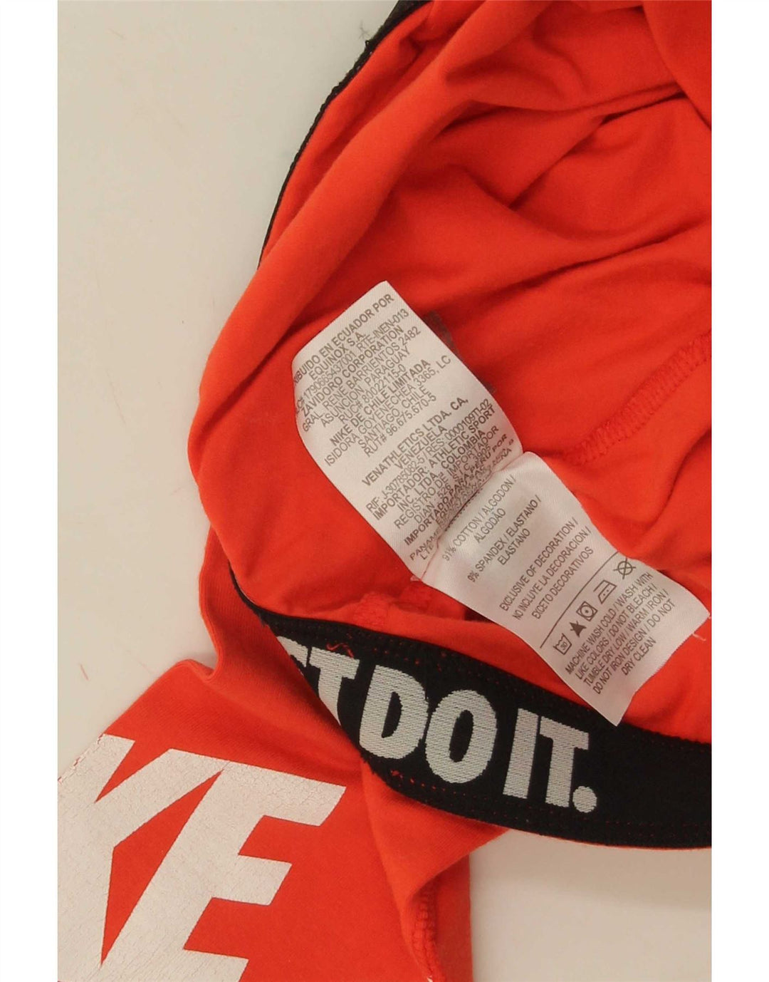 Nike Womens Graphic Leggings UK 8 Small Orange Cotton