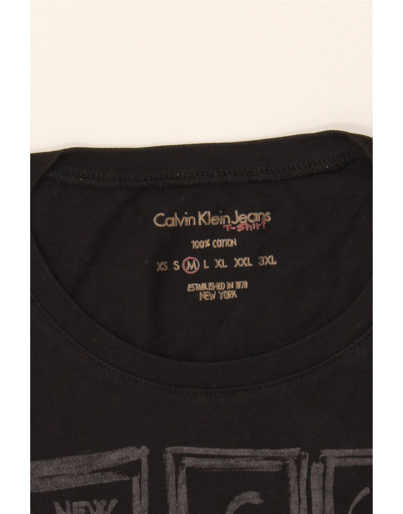 CALVIN KLEIN JEANS Mens Graphic T-Shirt Top Medium Black Cotton Vintage Calvin Klein Jeans and Second-Hand Calvin Klein Jeans from Messina Hembry 