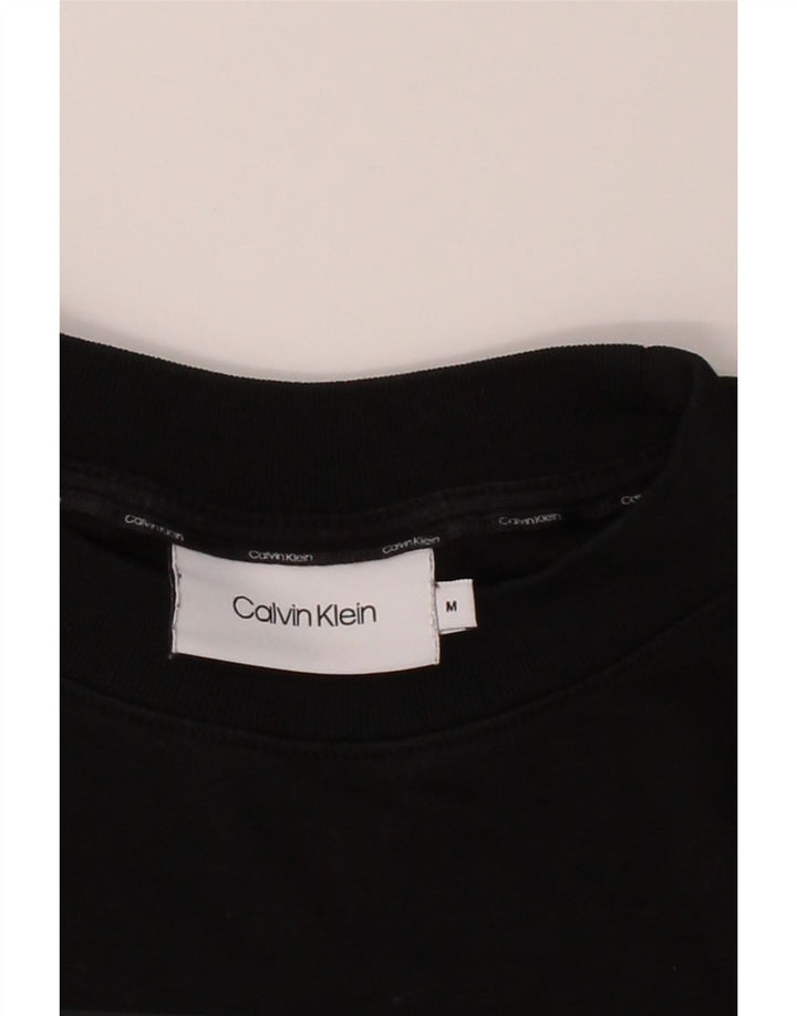 CALVIN KLEIN Womens Graphic Sweatshirt Jumper UK 14 Medium Black Cotton Vintage Calvin Klein and Second-Hand Calvin Klein from Messina Hembry 