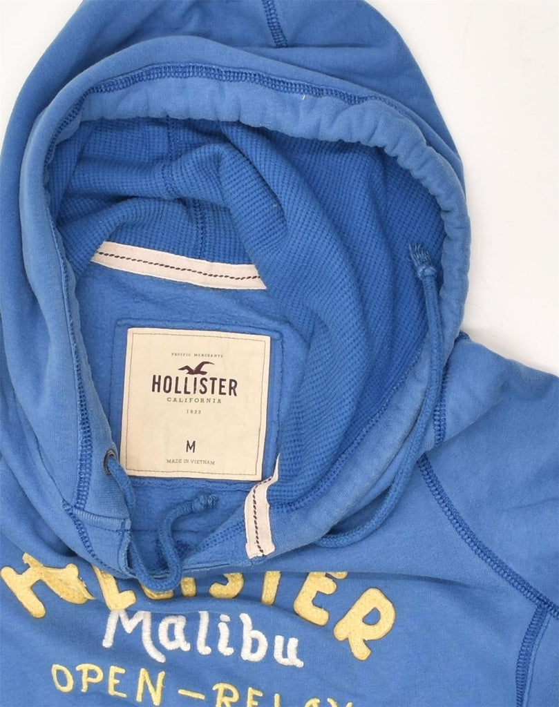 HOLLISTER Womens Graphic Hoodie Jumper UK 12 Medium Blue Cotton | Vintage Hollister | Thrift | Second-Hand Hollister | Used Clothing | Messina Hembry 