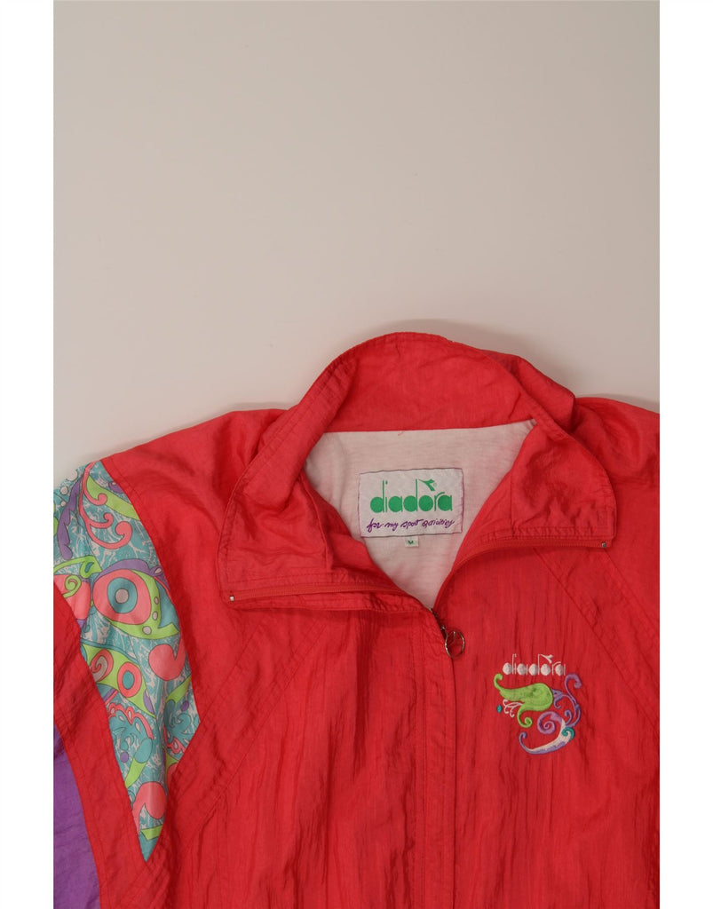 DIADORA Womens Oversized Graphic Tracksuit Top Jacket UK 14 Medium Pink Vintage Diadora and Second-Hand Diadora from Messina Hembry 